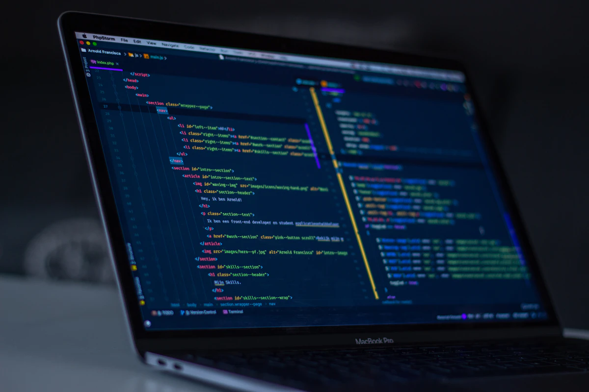 Code on a laptop screen for a custom web app